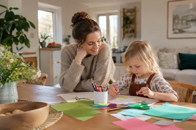 Language tutor guiding a young child through a creative lesson